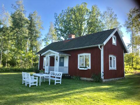 Red cottage at lake Viken