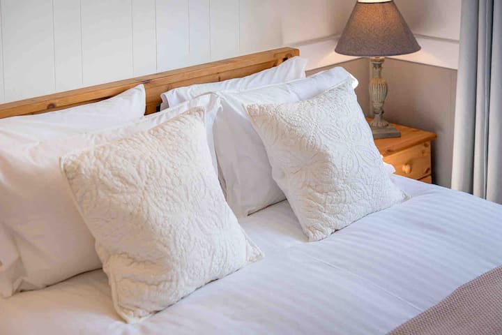 Cozy beds with White Company linen 