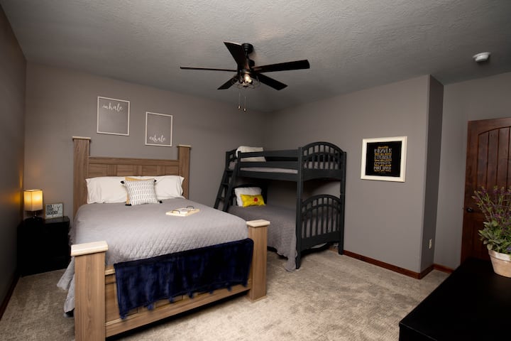 Bedroom #1 has a comfortable queen size bed with bedside lamp with charging ports.  Additionally, twin bunk beds to accommodate extra sleepers!