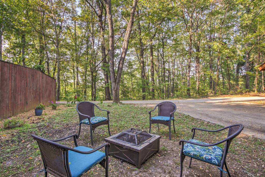 Nestled amidst a peaceful forested wilderness, this home is immersed in nature.