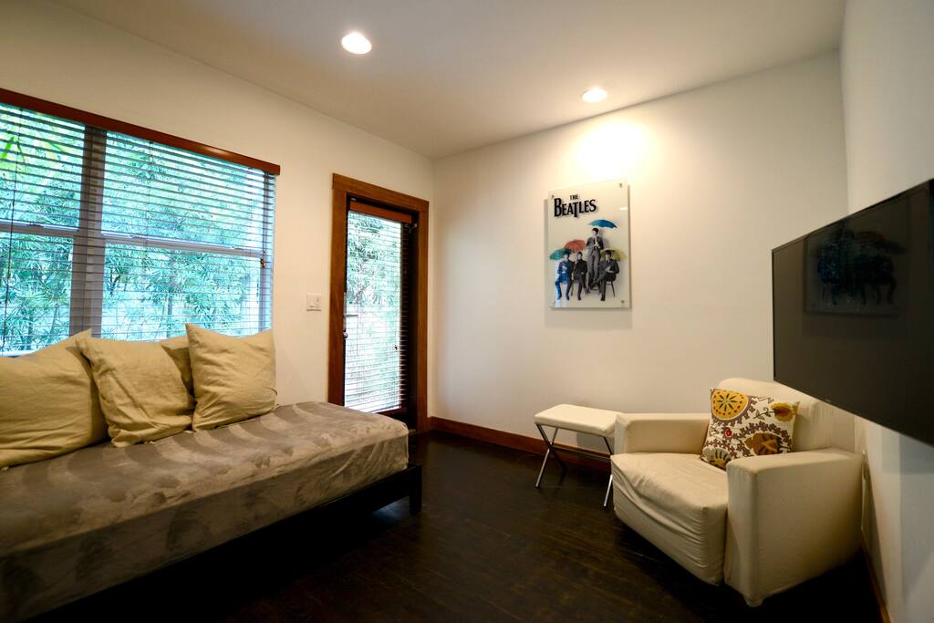 TV Room area with lots of natural light.