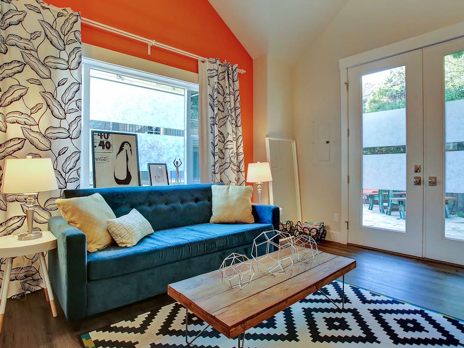 Living room couch turns into a premium fold out bed with memory foam mattress.