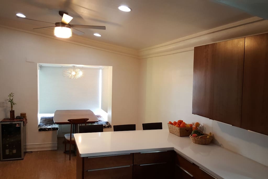 Dining nook offers privacy or connection to front patio with the blinds up.