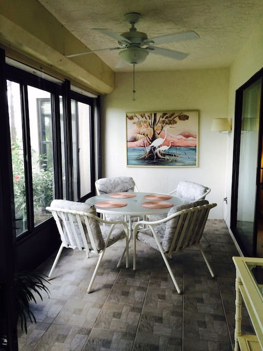 Enclosed lanai for summer/winter comfort with pass through window to the kitchen.