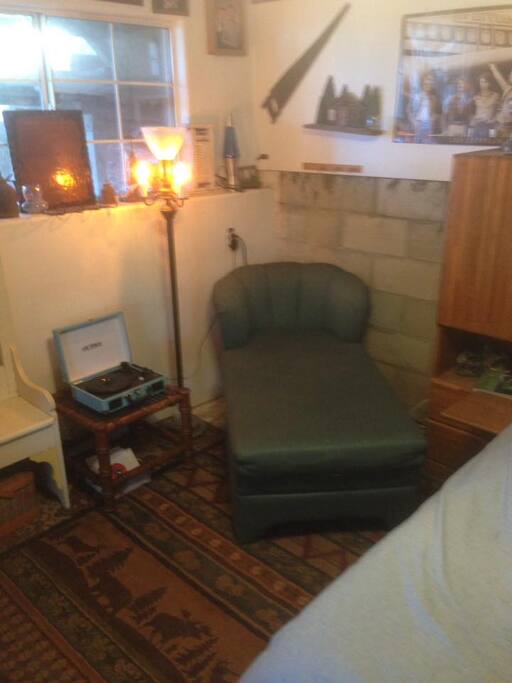 Otoman and record player for hanging out. bluetooth too