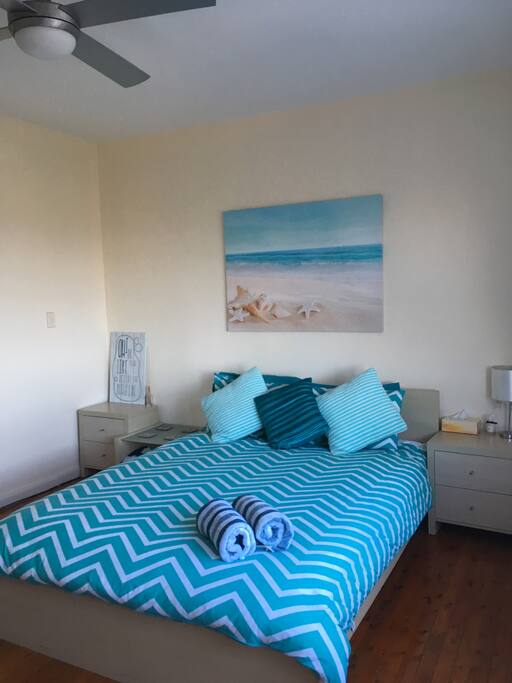 Main bedroom with Queen Bed and bedside tables