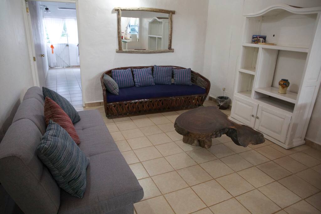Living room with sofa bed (left)