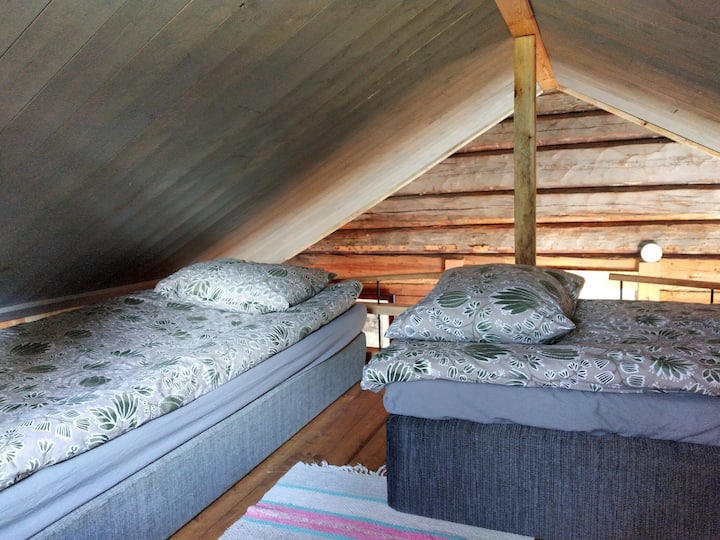 Time to rest and nice dreams! 
The sleeping loft has two beds with pillow and duvet. 