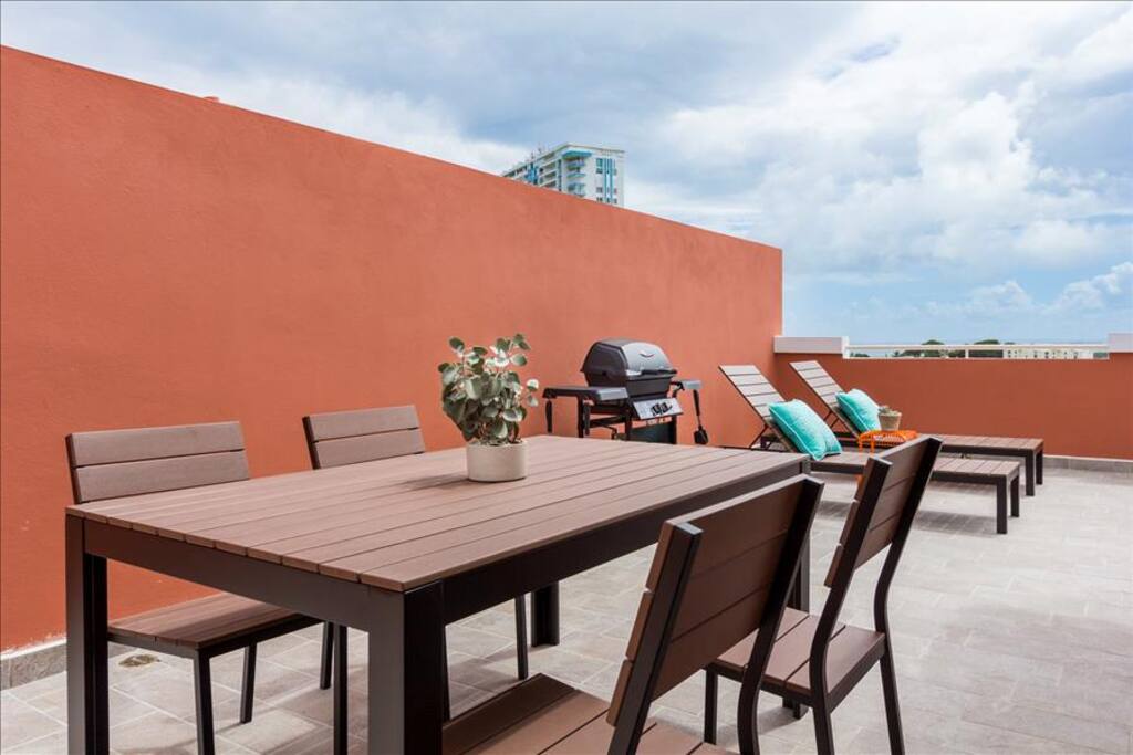 Dining table and grill on the rooftop