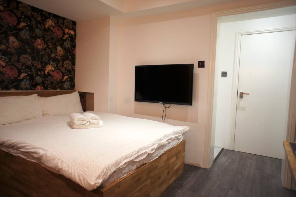 Here's your studio with double sofa-bed and patio