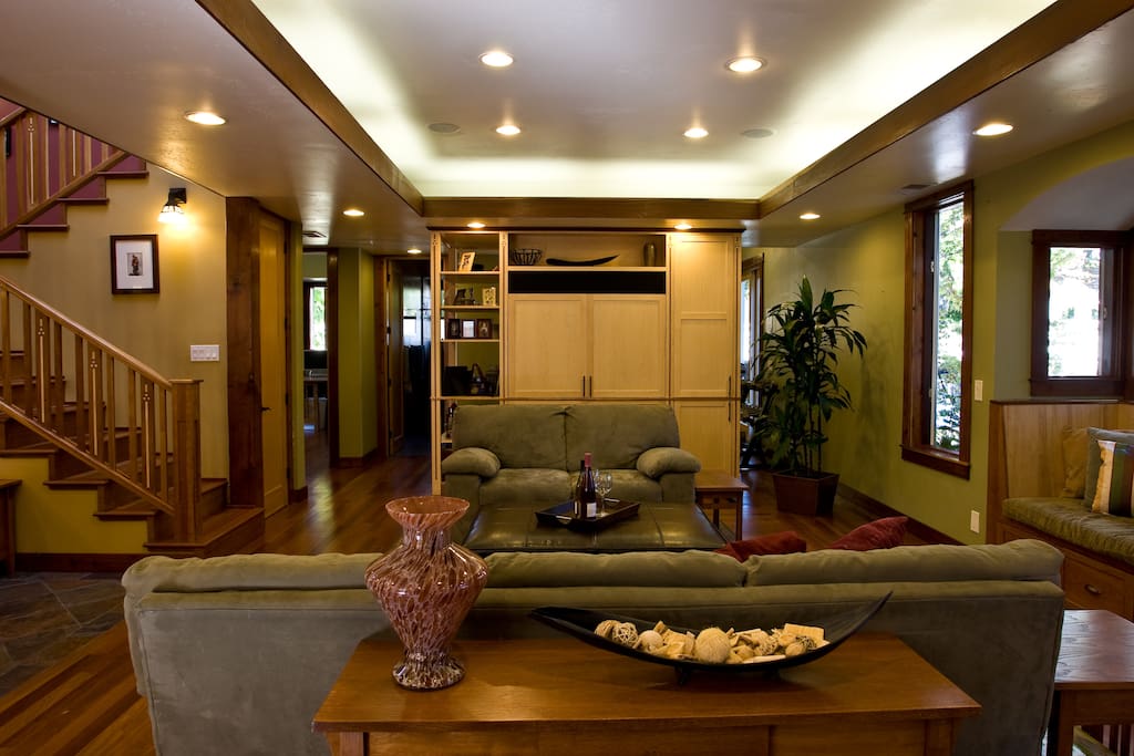 Lighted Soffit and Large Hidden TV with Home Theatre System built into the ceilings