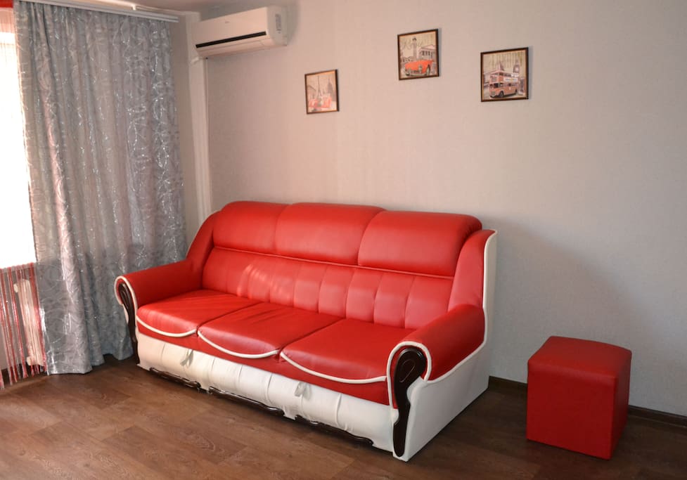 This is a cozy room, where there is a double bed and a folding modern sofa. Air conditioning, a balcony where you can smoke.