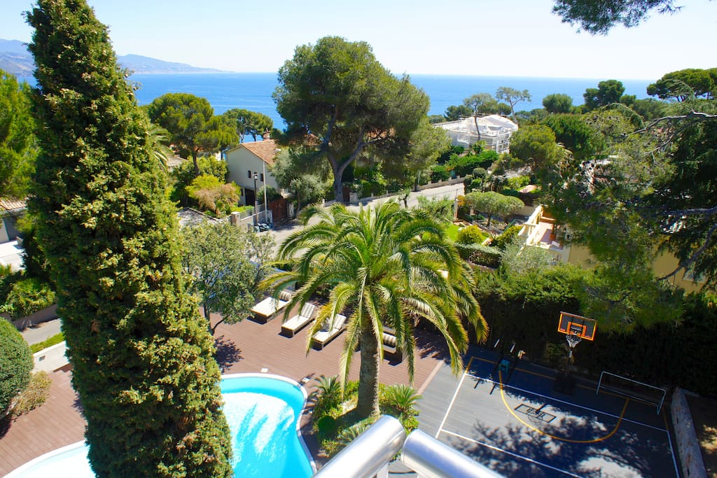 The pool area with heated pool and sea view throughout