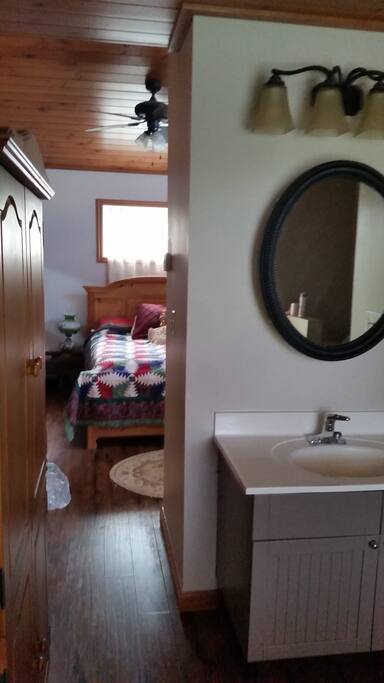 View from private bathroom into bedroom