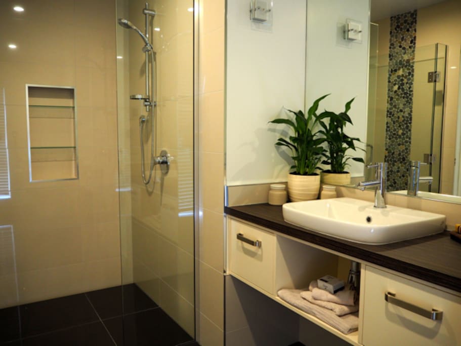 Ensuite with large level entry shower.