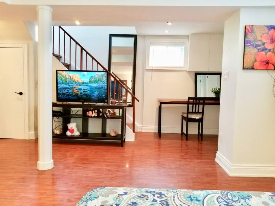 Entertainment space + office desk