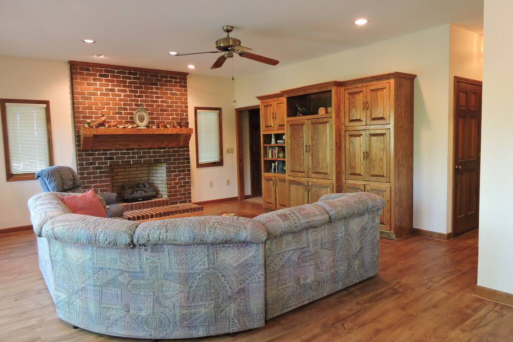 Living Room with new hardwood floors
and antique brick fireplace