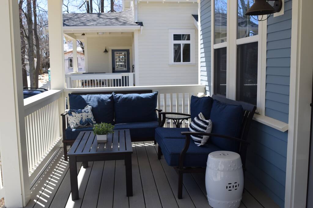 Other side of front porch. Steps from heated pool.