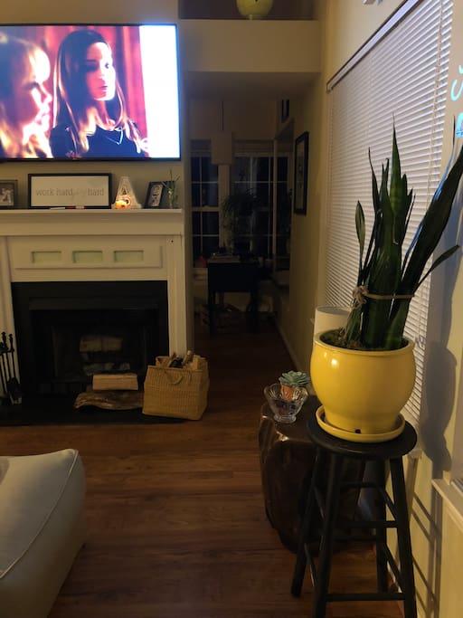 Taken at entrance. Den area and sunroom/office w TV