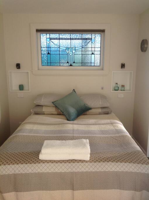 Stunning leadlight window takes centre stage.