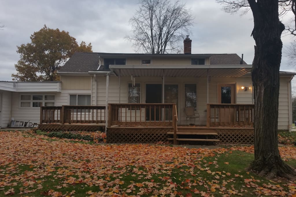 Large wrap around back yard deck