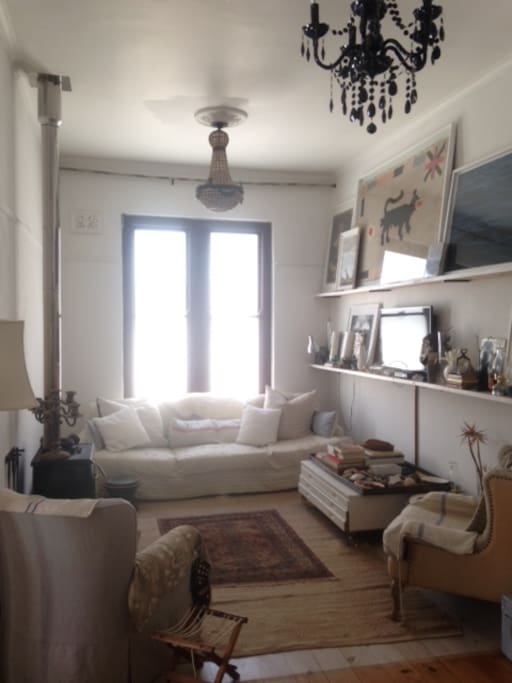 A view of the lush, comfortable lounge where you can borrow a book and curl up on the 3m couch alongside the fireplace.
