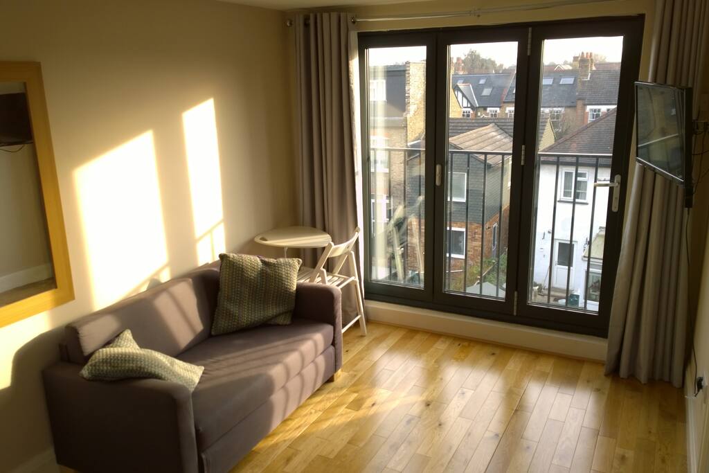 Sitting area with smart TV in loft room