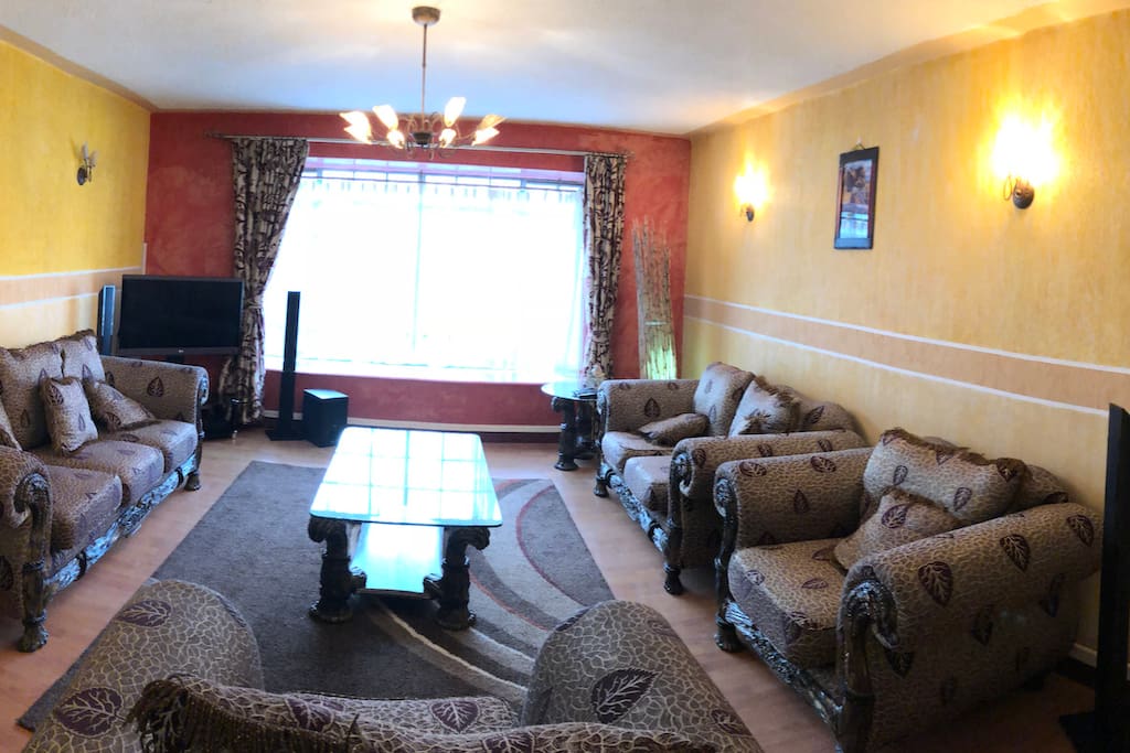 Beautiful Living area with Royal 7 seater, Flat screen TV, Home theatre, DVD player, WiFi - relax and lounge with the family.
