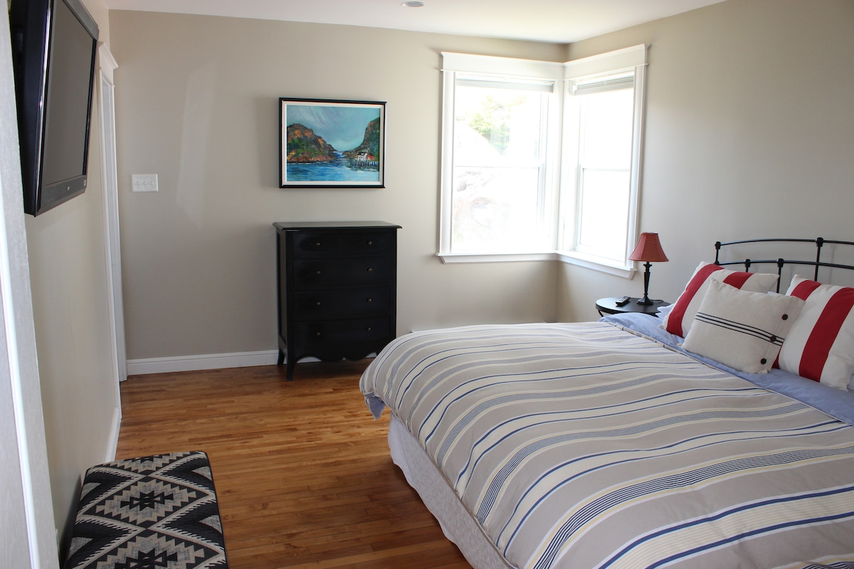 Dormitorio principal con cama king