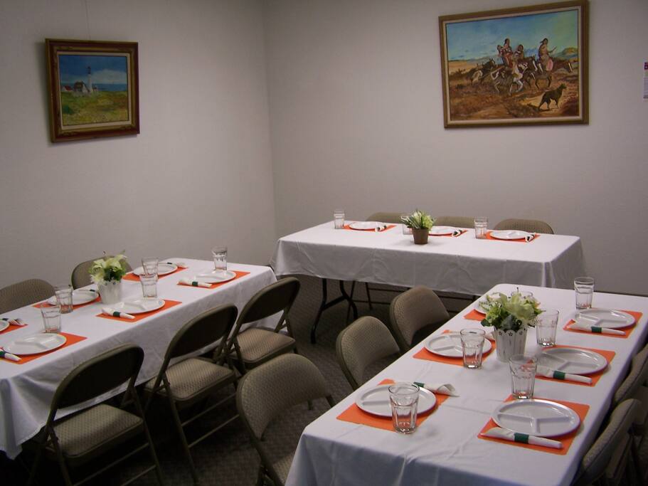 This conference room is small; with the tables folded up 10 people could easily sleep there. We don't provide any beds.