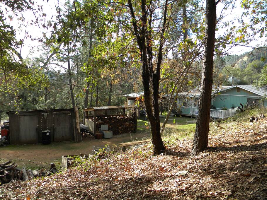 Out-buildings near the guest room side of the house.