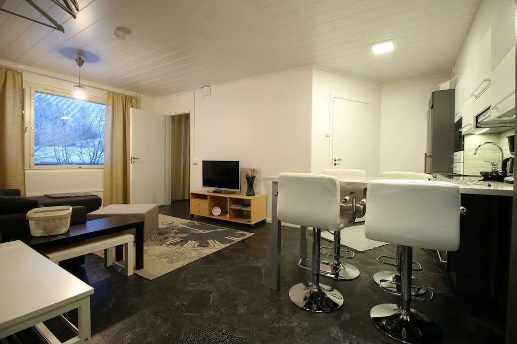 The living room and kitchen