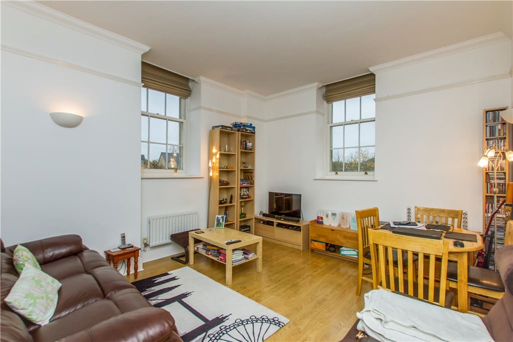 Spacious sitting room with DVD player, access to DVD's, and books so you can kick back and relax and enjoy your stay!