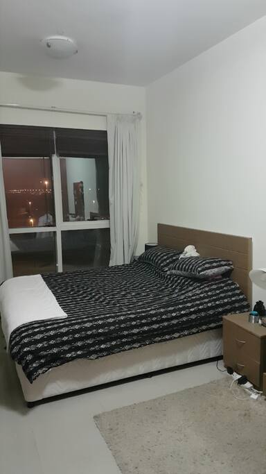 Ensuite bedroom with king sized bed and wardrobe space
