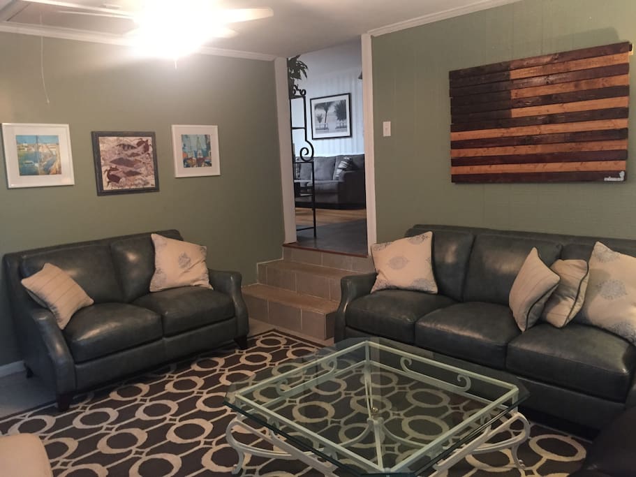 Large TV Room that comfortably sits 8 but can sit 10+