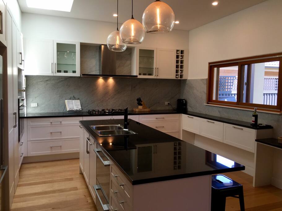 Beautiful kitchen, gas stove with granite bench top, double dish washer draw, electric stove