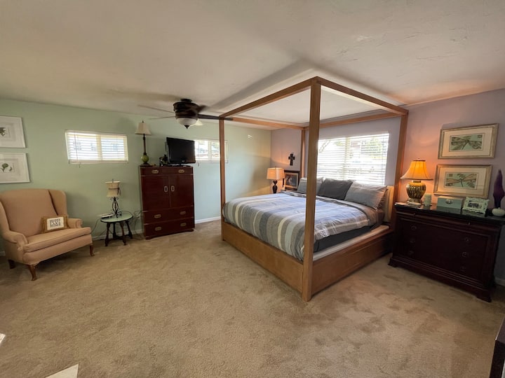 Huge master bed with tons of storage space and a tv to allow for kids to watch videos and play video games. 