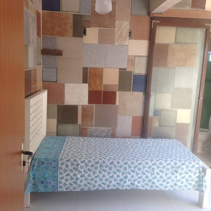 cama do quarto, podendo optar por uma cama extra, sem custo.