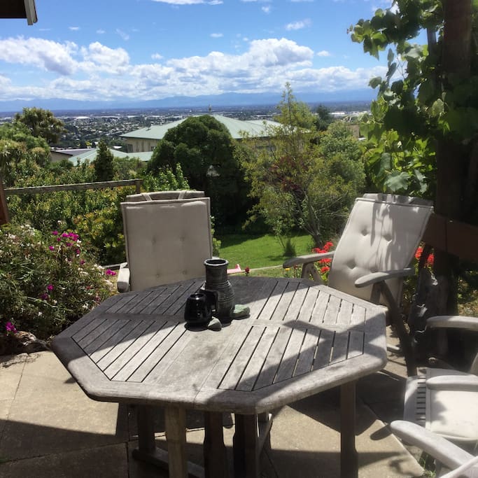 Seating under the grape vines with mountain views, great for breakfast, lunch or evening relaxing.