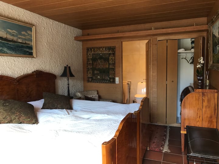 Room 1 has a king-size double bed with ensuite bathroom