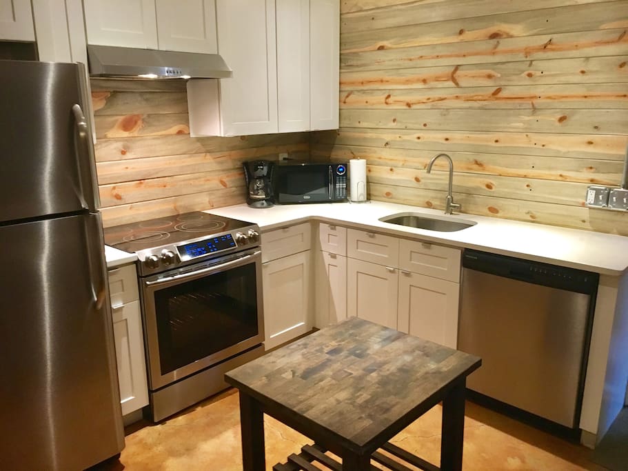 Colorado reclaimed beetle pine kitchen, white quartz countertops & soft close cabinets