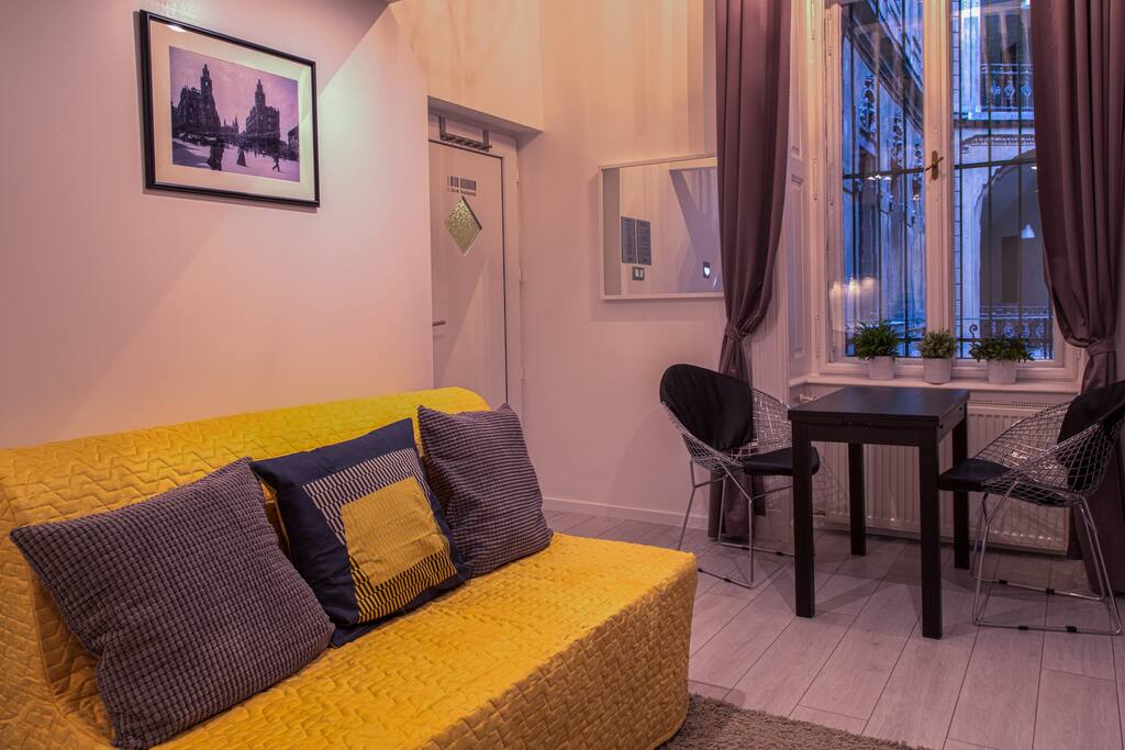 Living Area, Dining Table and Sofa Bed