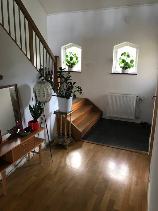 The hallway where you enter the house and the stairs that leads up to your room.