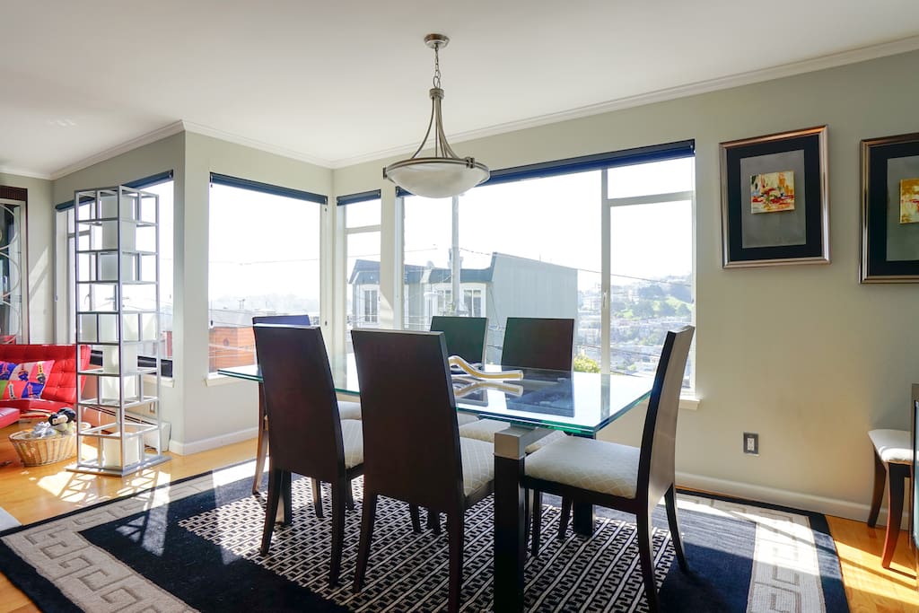 Dining room has sweeping, dramatic views from Twin Peaks down to Eureka Valley down to the Bay