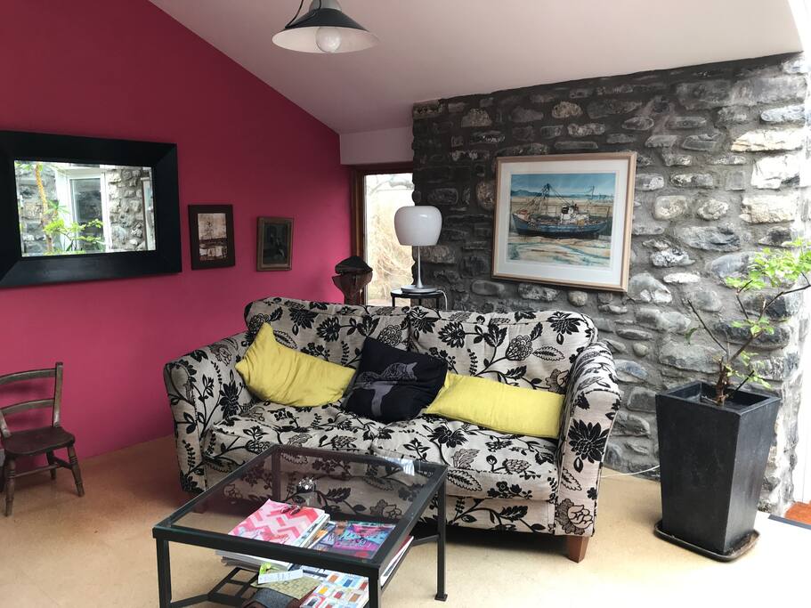 Sitting room leading out to enclosed garden with magnificent apple tree.