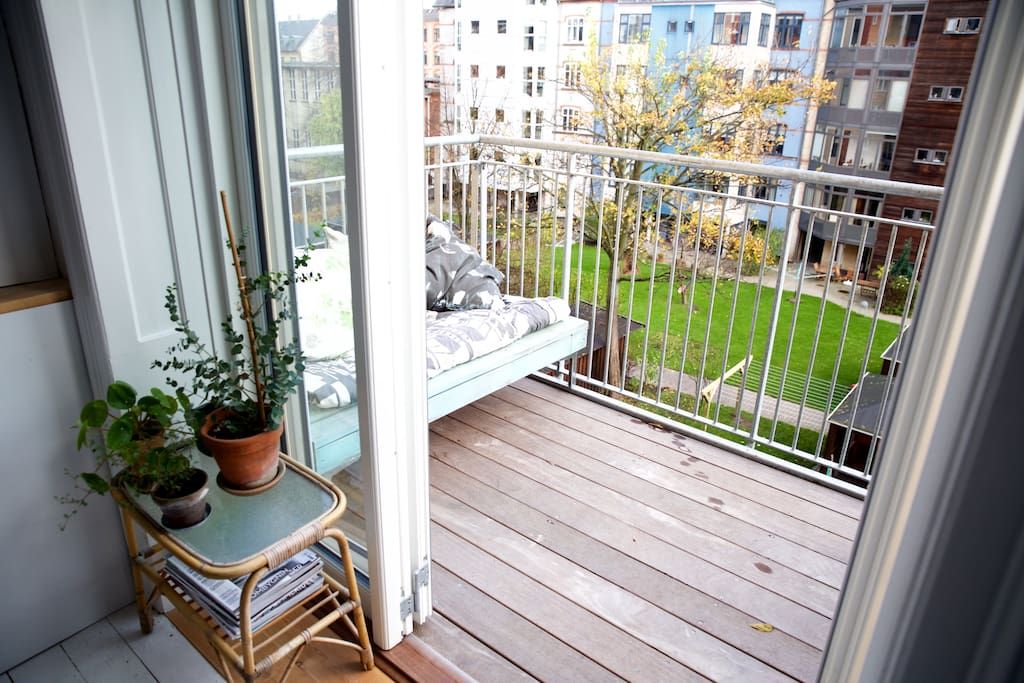The balcony, overlooking a large, green and quite backward