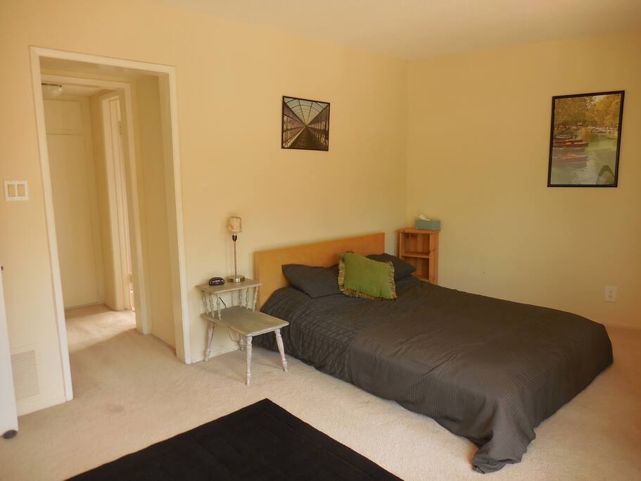 Your queen size bed, en suite bathroom and walk in closets.