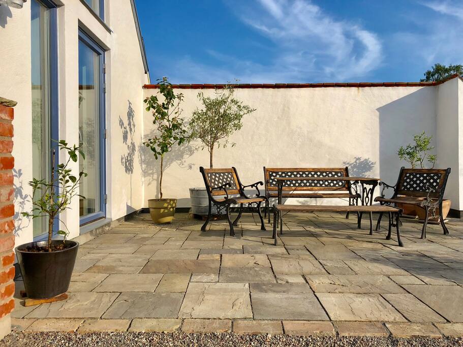 Stone patio facing southwest - great for relaxing in the afternoon and evening