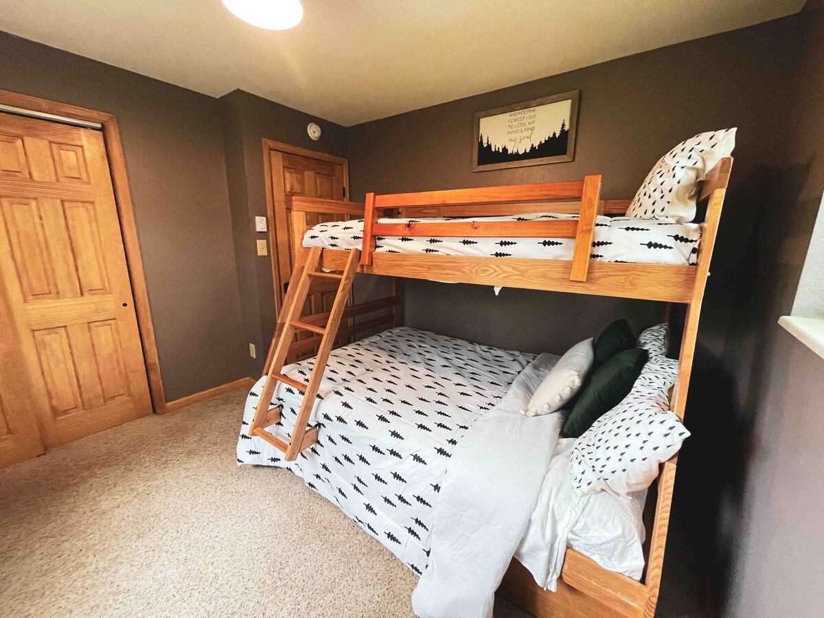 Large closet equipped with extra pillows and blankets