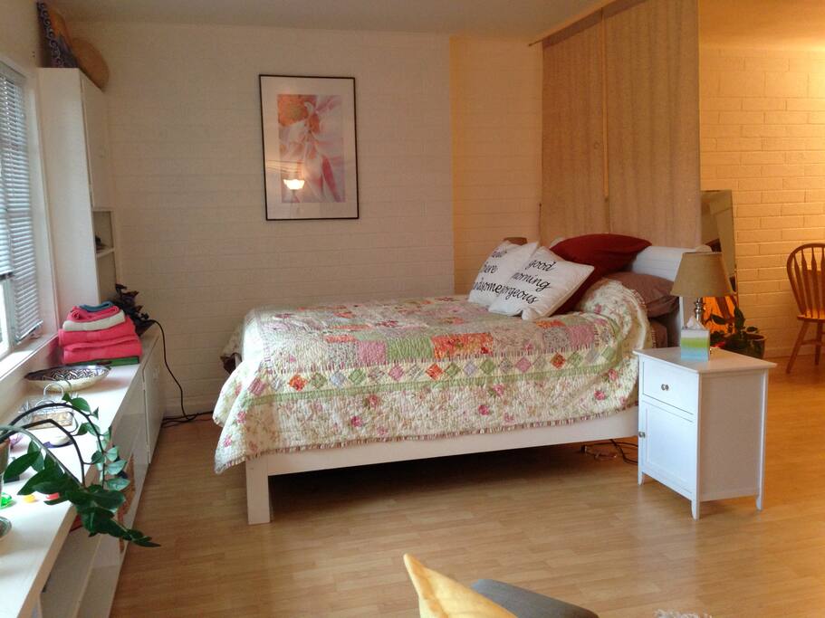 A comfy queen bed.